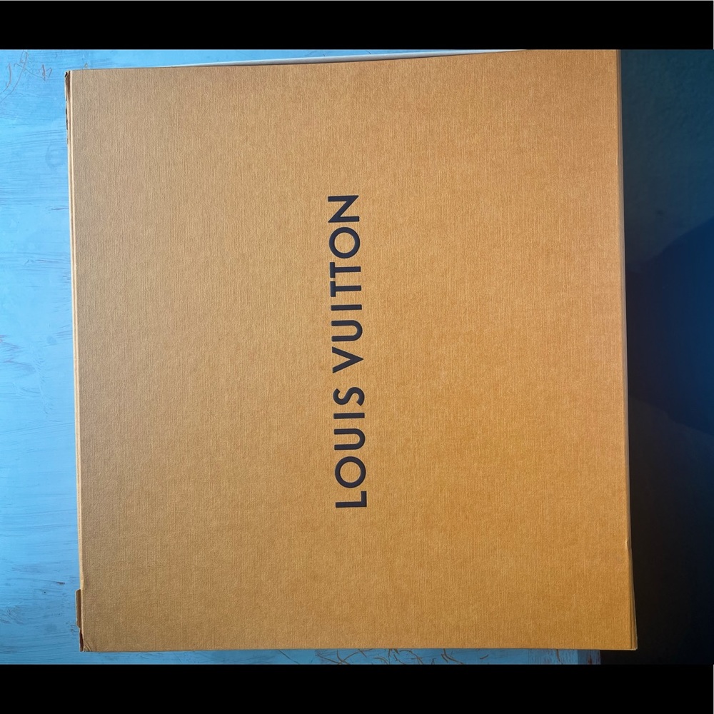 Louis Vuitton Box, Duster, and tie.